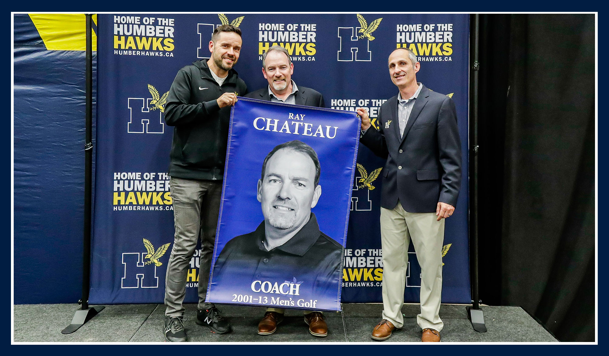 Ray Chateau holding his banner
