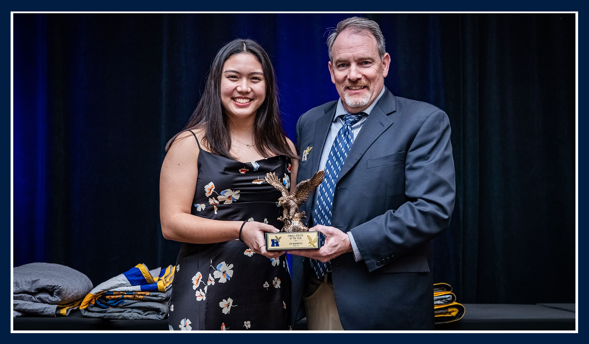 Airi receiving her award from Ray Chateau