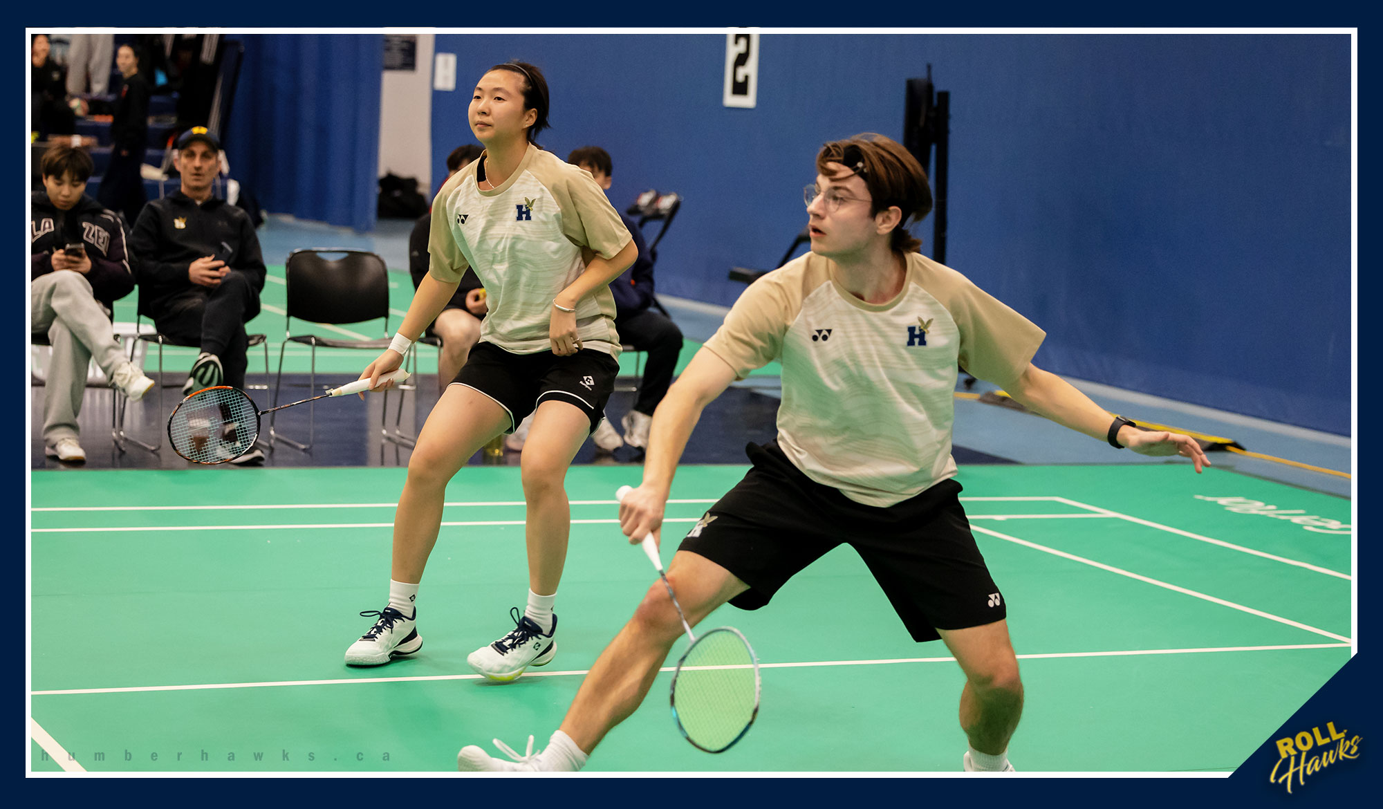 Jack and Catherine playing badminton