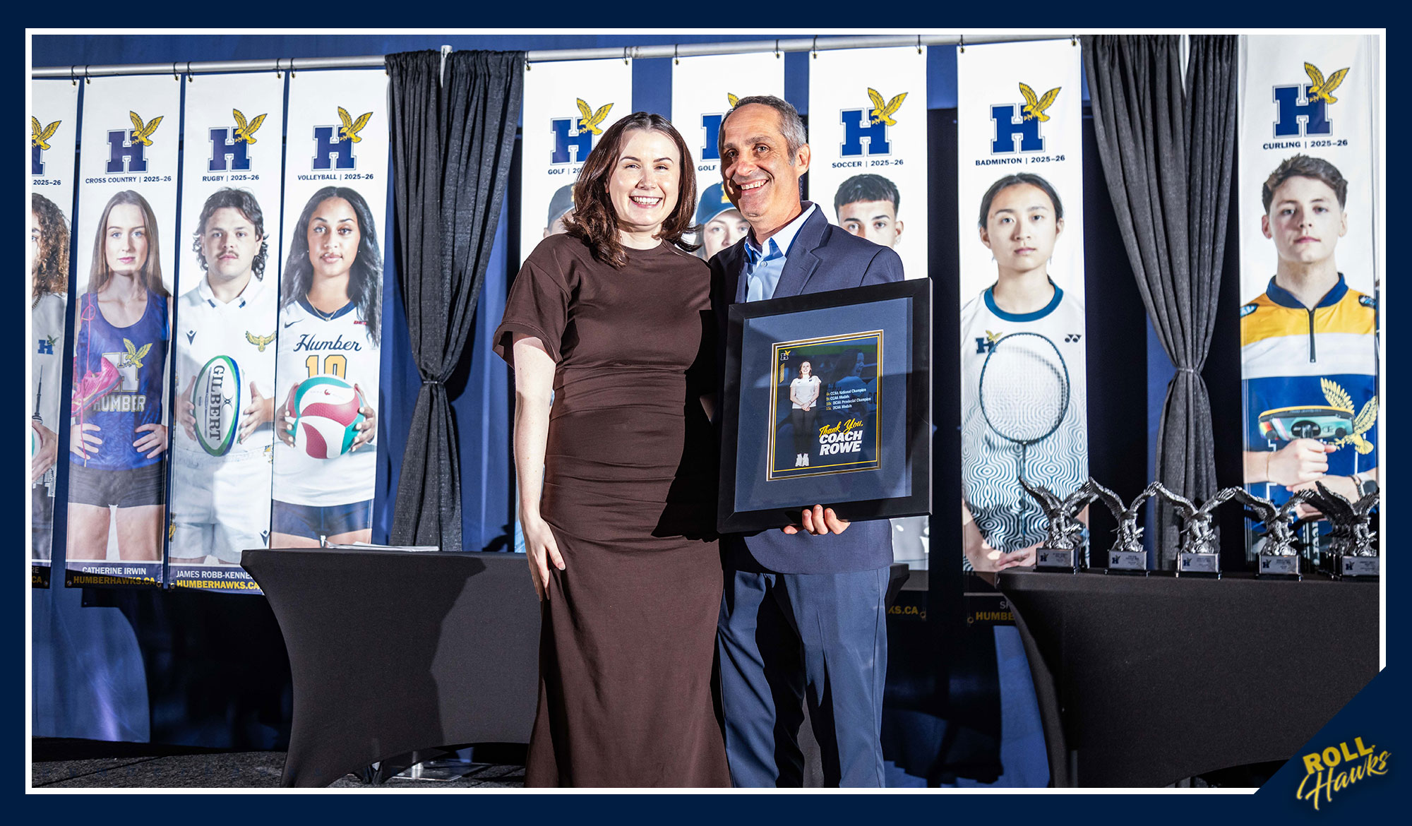 Chloe Rowe receiving award at banquet