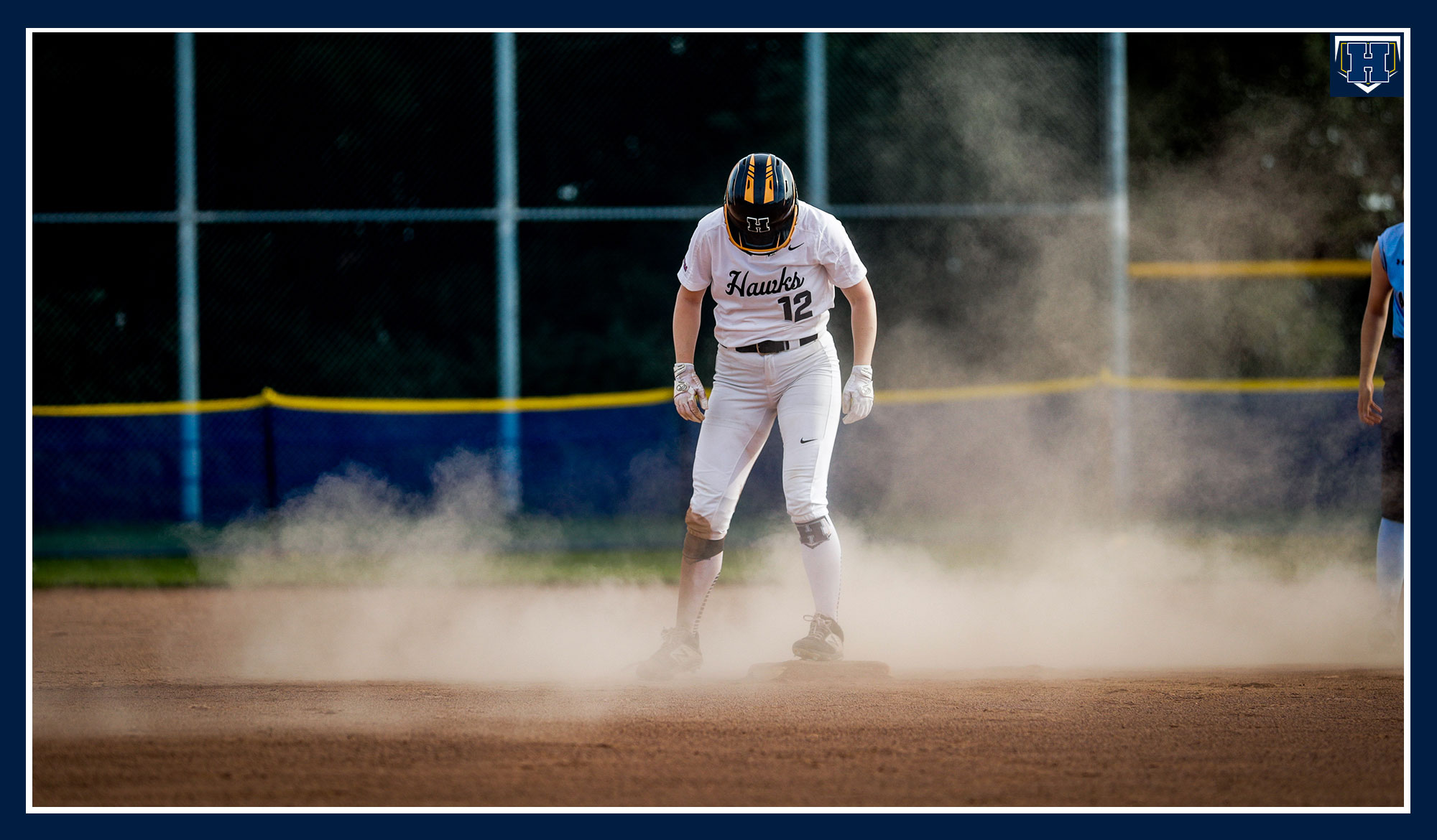 Cloud of dust surrounding Koziolek after sliding into second base