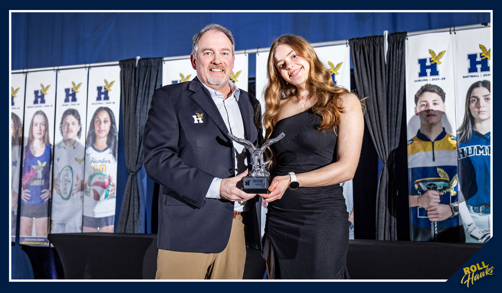 Maddy receiving her award