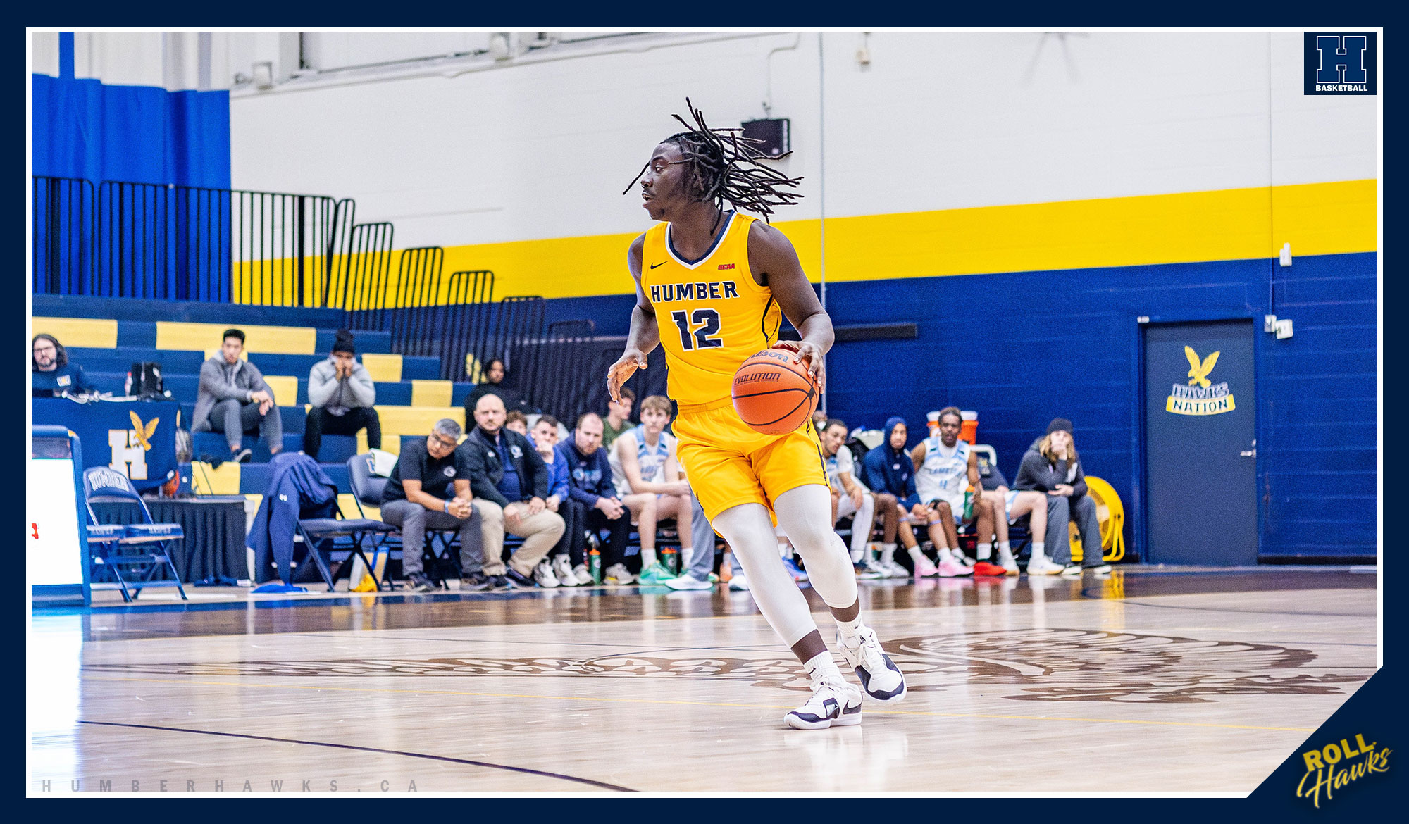 No. 1 Men's Basketball clinches division with road win