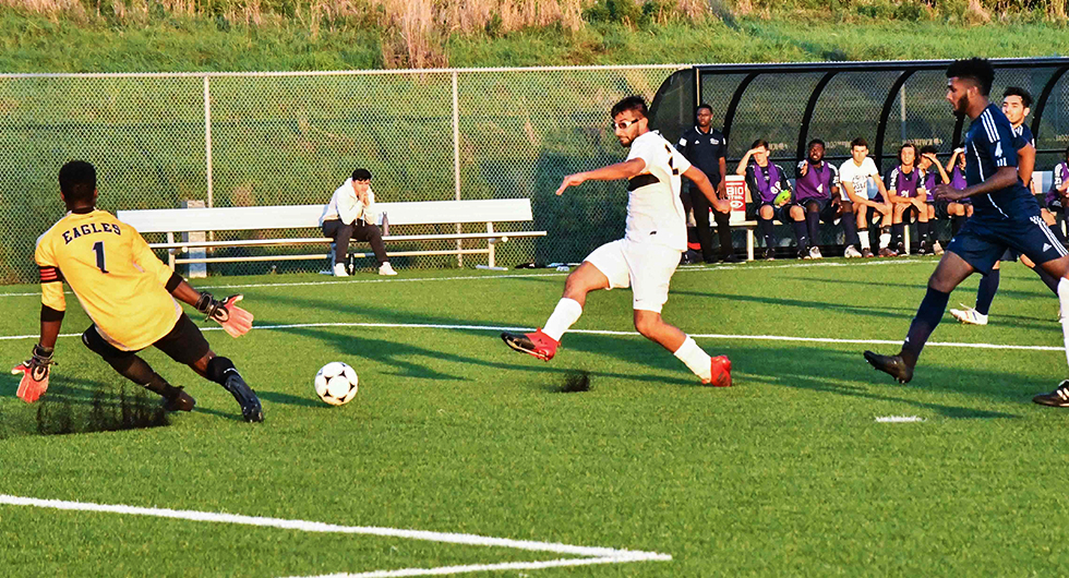 FIRST HALF GOALS ALLOW No.1 HAWKS TO HOLD OFF EAGLES