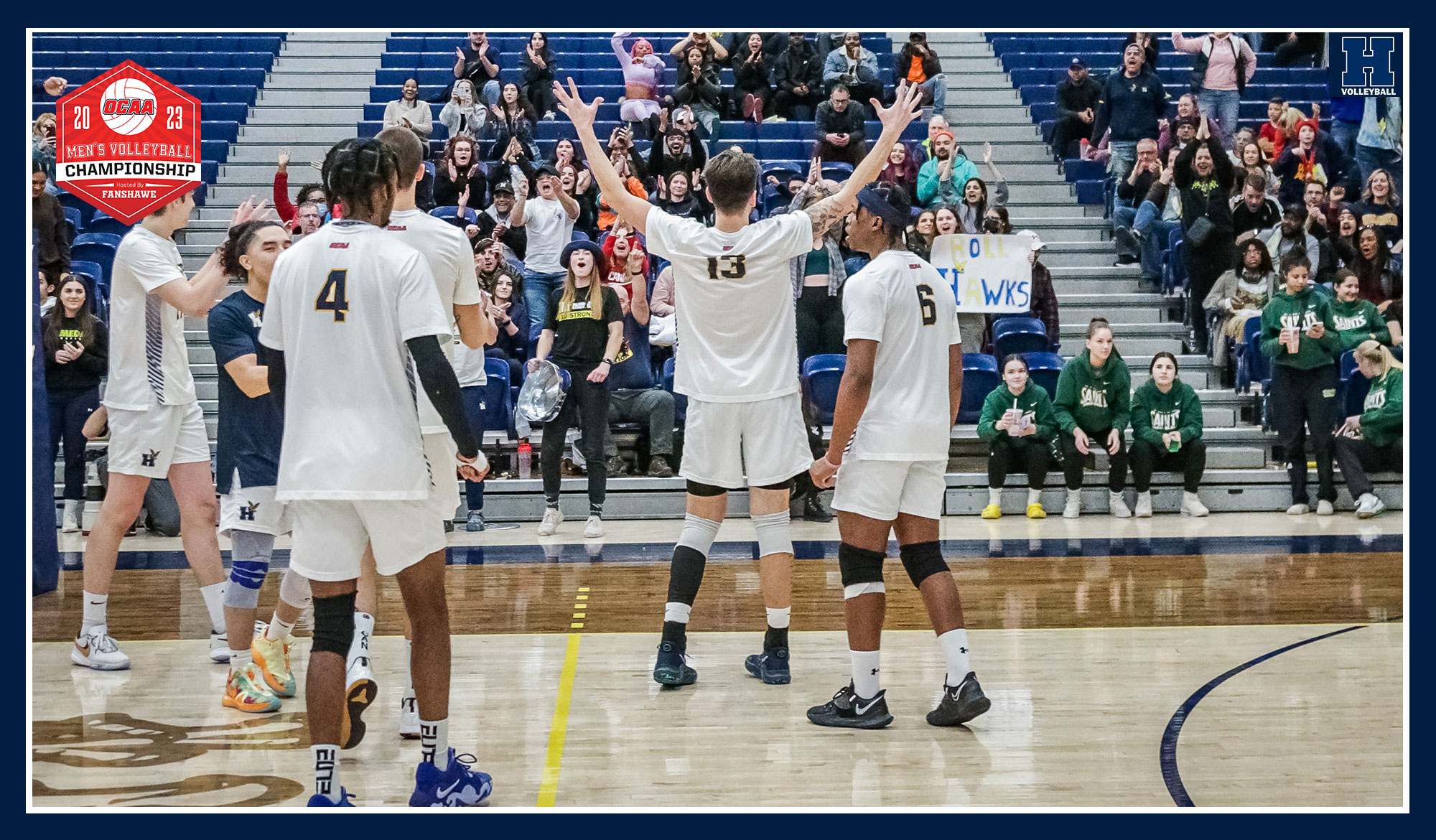 Men's volleyball thanking the crowd after a win