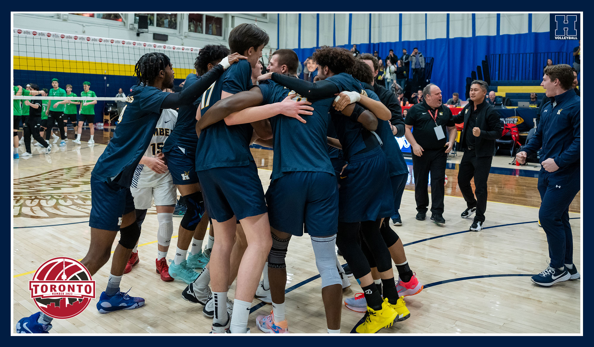 Men's volleyball celebrating after earning spot into the finals