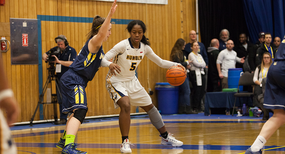No. 8 OOKS UPSET No. 1 HAWKS ON HOMECOURT
