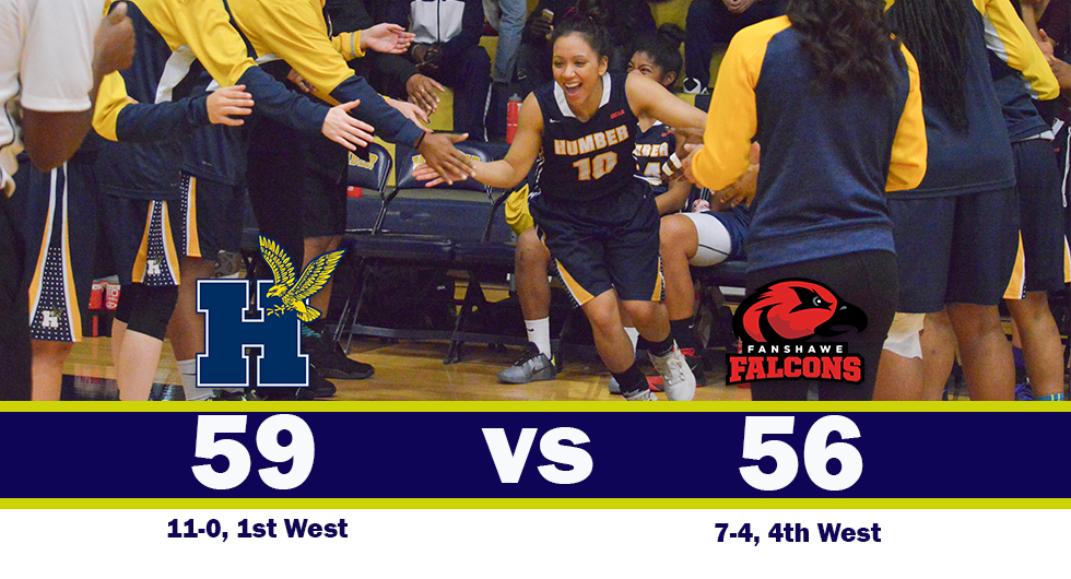 HAWKS CHALLENGED BUT STAY PERFECT WITH 59-56 ROAD WIN