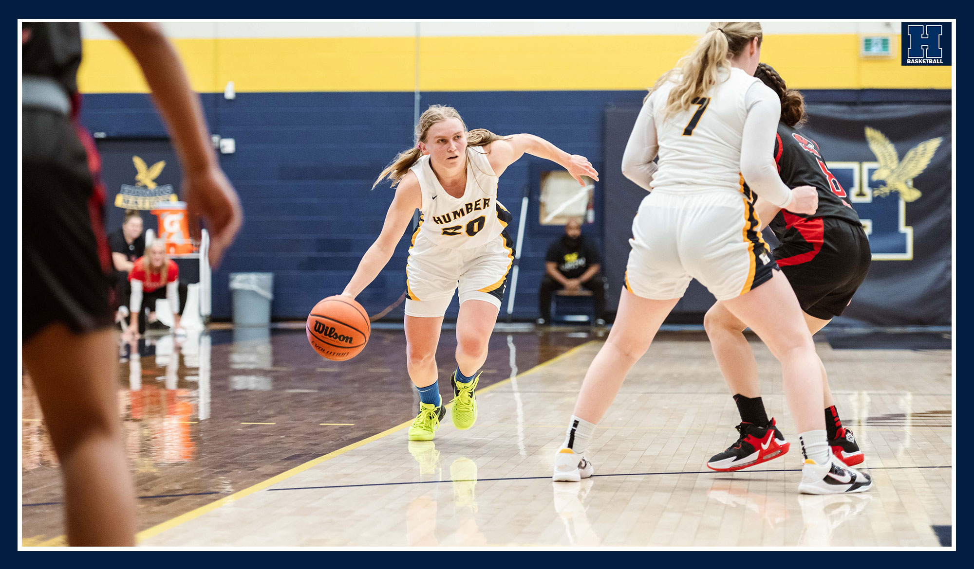 Sydney Crawford dribbling up the sideline