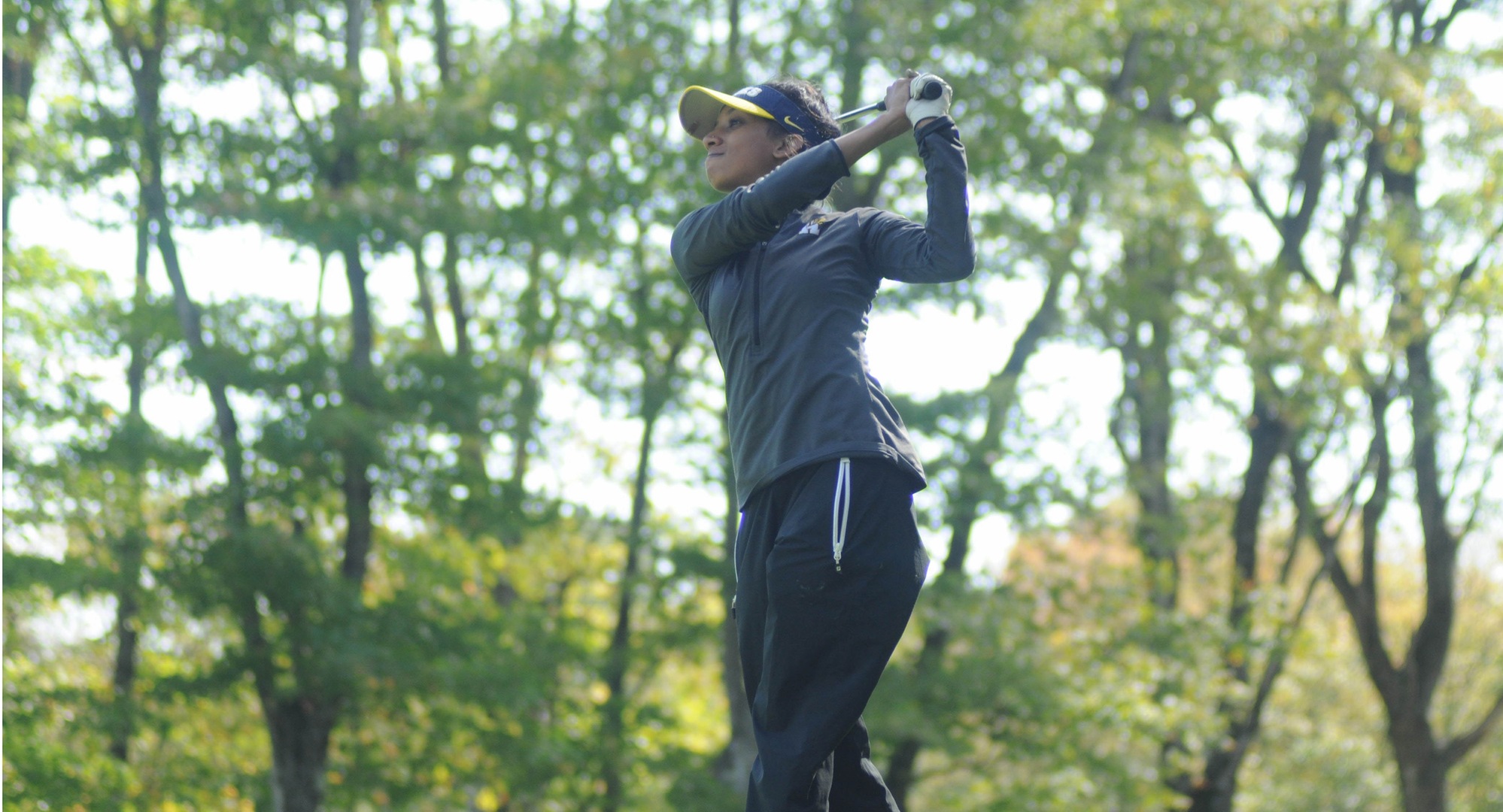 HAWKS WOMEN LEAD BY FIVE HEADING INTO FINAL DAY