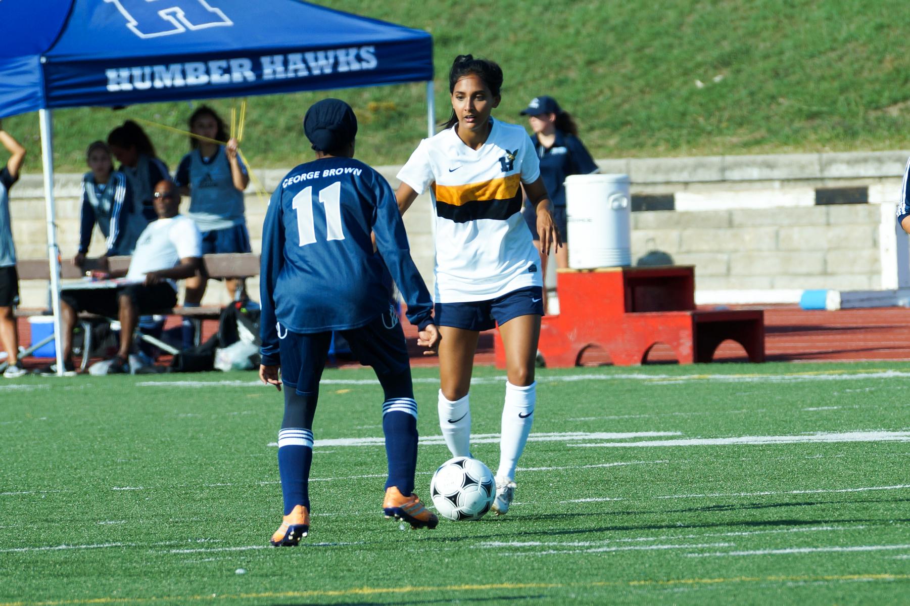 HAWKS PLAY HUSKIES TO STAY ON TOP
