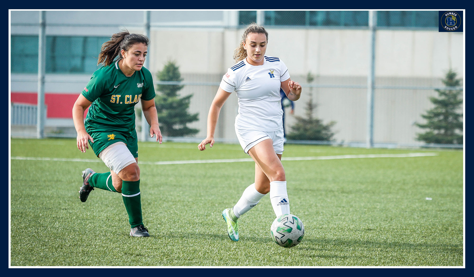 Spalla dribbling past a St. Clair defender